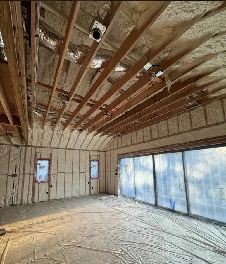 Interior walls and ceiling insulated with spray foam during new construction in Somers